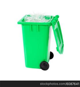 full green recycling bin with plastic