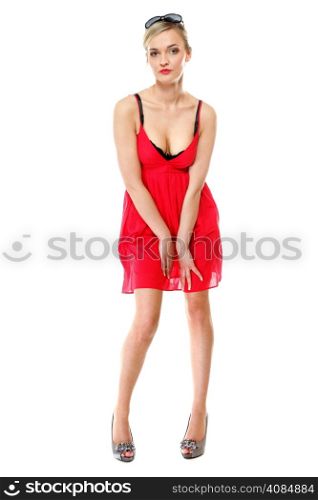 Full length beautiful blonde girl in red summer dress. Studio shot isolated on white background