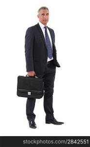 Full length businessman with a briefcase