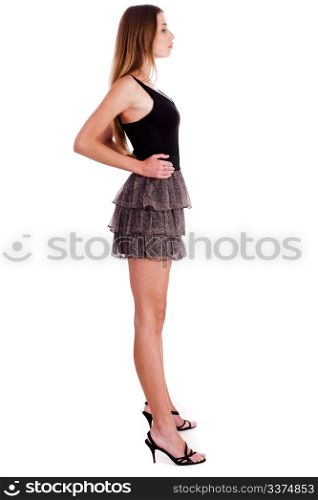 Full length of a beautiful blonde girl over white background, side view