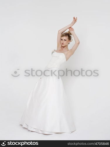 Full length of bride wearing luxurious wedding dress