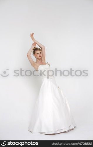 Full length of bride wearing luxurious wedding dress