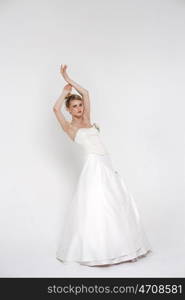 Full length of bride wearing luxurious wedding dress