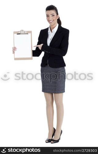 Full length of business woman pointing at the clipboard over white background