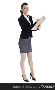Full length of business woman writing in pad over white background