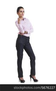 Full length of confident businesswoman looking away isolated over white background
