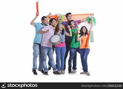 Full length of excited young friends looking away while cheering with Indian flag over white background