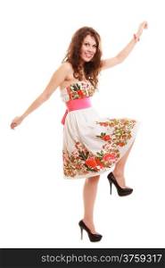 Full length of fashionable young woman. Funny girl in summer floral dress isolated. Fashion. Studio shot.