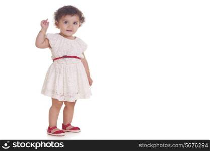 Full length of innocent girl against white background