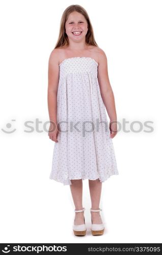 Full length of smiling young girl standing and looking at you over isolated white background