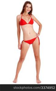 Full length of stunning woman in red bikini posing over white background