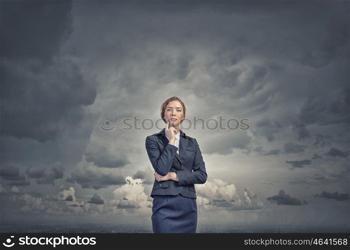 Full length of thoughtful business woman looking away. Pensive businesswoman