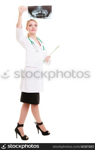 Full length of woman doctor radiologist in lab coat with clipboard looking at the x-ray isolated. Medical person for health insurance.