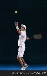 Full length of young male tennis player preparing to serve