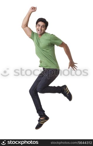 Full length of young man jumping in air