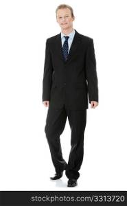 Full length portrait of a handsome business man standing against white background