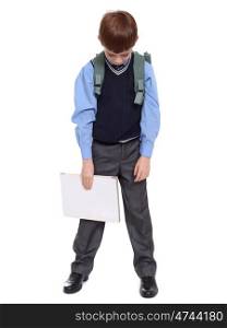 Full length portrait of a schoolboy isolated on white background