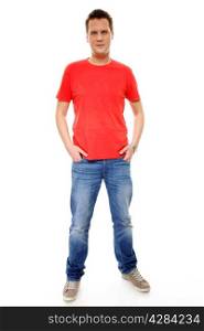 Full length portrait of a young man with hands in pockets , isolated on white background