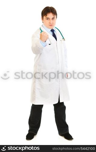 Full length portrait of angry medical doctor threaten with fist isolated on white&#xA;