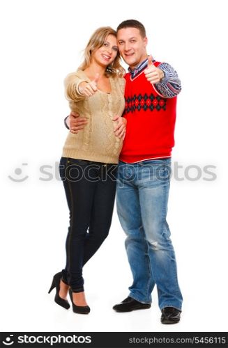 Full length portrait of beautiful pregnant woman with husband showing thumbs up isolated on white&#xA;