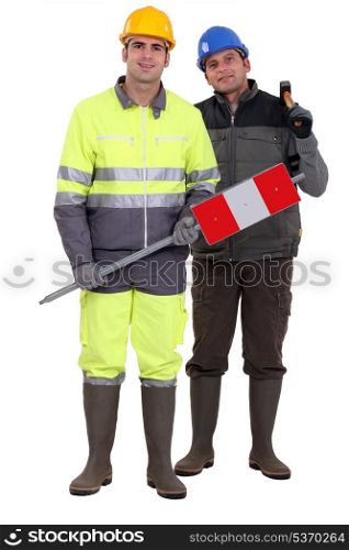 full-length portrait of bricklayer and carpenter