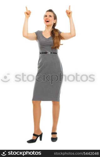 Full length portrait of business woman pointing up