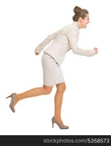 Full length portrait of business woman running sideways