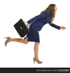Full length portrait of business woman with briefcase running sideways