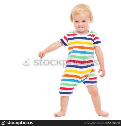 Full length portrait of cheerful baby in swimsuit