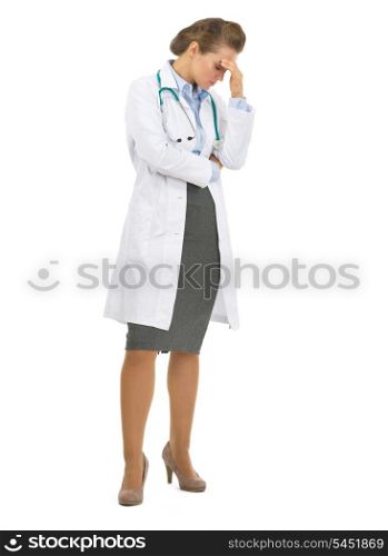 Full length portrait of concerned doctor woman