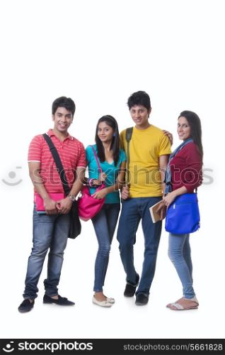 Full length portrait of confident college friends against white background