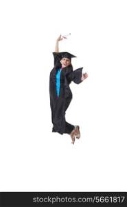 Full length portrait of excited graduate student jumping over white background