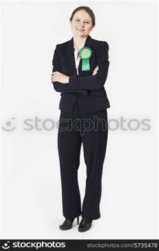 Full Length Portrait Of Female Politician Wearing Green Rosette