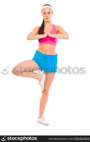 Full length portrait of fitness girl in yoga pose isolated on white&#xA;