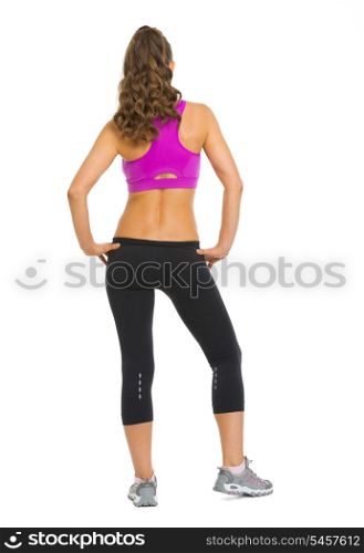 Full length portrait of fitness young woman. rear view