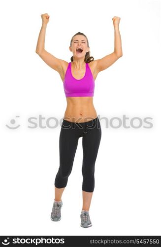 Full length portrait of fitness young woman rejoicing success