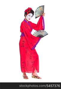 Full length portrait of geisha dancing with fans isolated on white