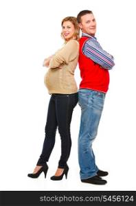 Full length portrait of happy beautiful pregnant woman with husband on white background &#xA;