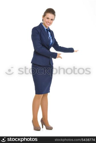 Full length portrait of happy business woman inviting