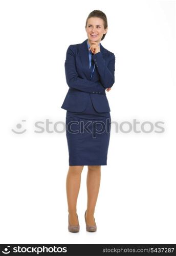 Full length portrait of happy business woman looking on copy space