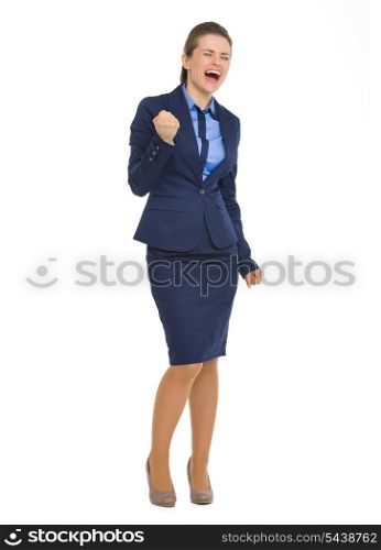 Full length portrait of happy business woman making fist pump gesture