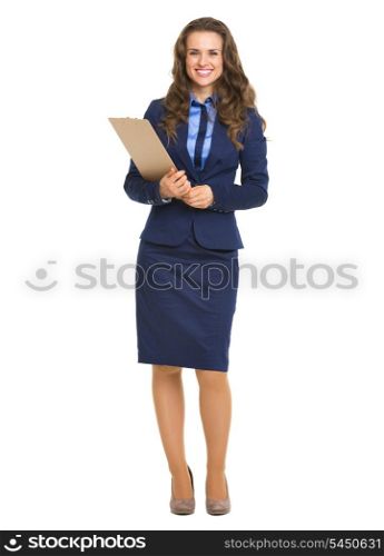 Full length portrait of happy business woman with clipboard