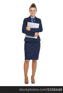 Full length portrait of happy business woman with folder