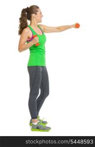 Full length portrait of happy fitness young woman making exercise with dumbbells