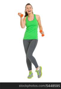 Full length portrait of happy fitness young woman with dumbbells