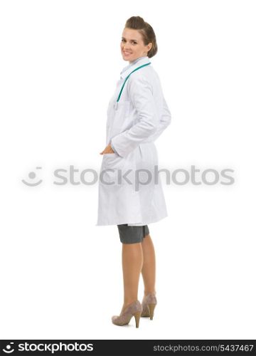 Full length portrait of happy medical doctor woman