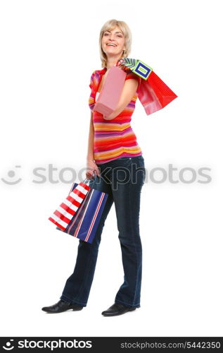 Full length portrait of happy old woman with shopping bags