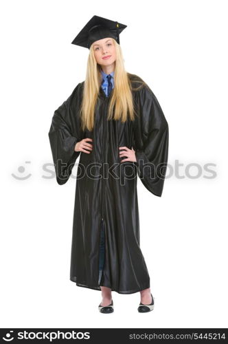 Full length portrait of happy young woman in graduation gown