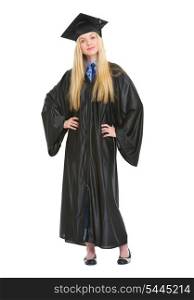 Full length portrait of happy young woman in graduation gown