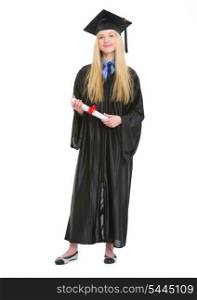 Full length portrait of happy young woman in graduation gown with diploma